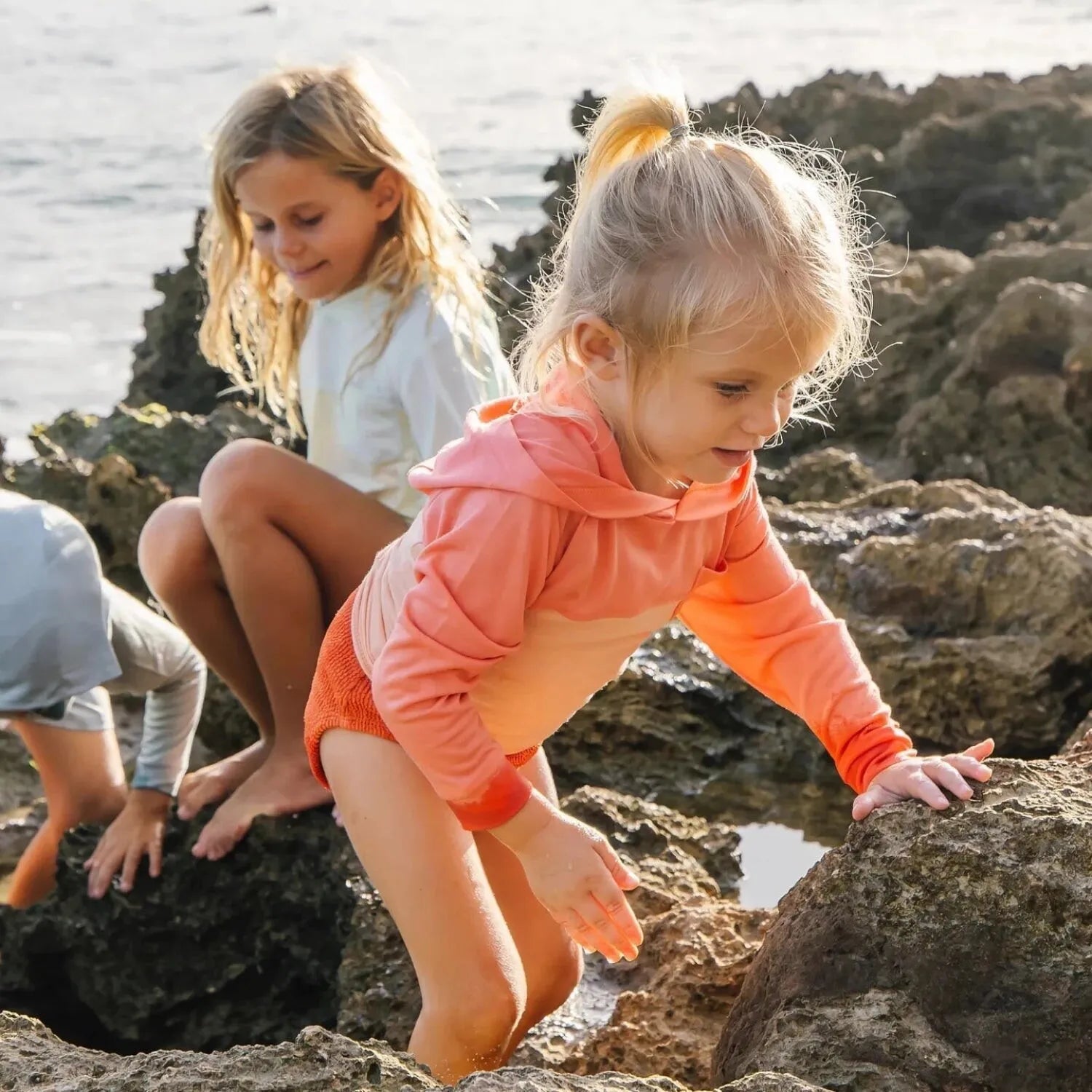Free Fly Toddler Bamboo Shade Hoodie in flamingo & coral peach, lifestyle view
