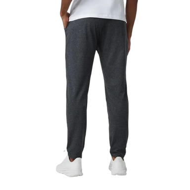 Vuori Men's Ponto Performance Pant in charcoal heather, on model back view