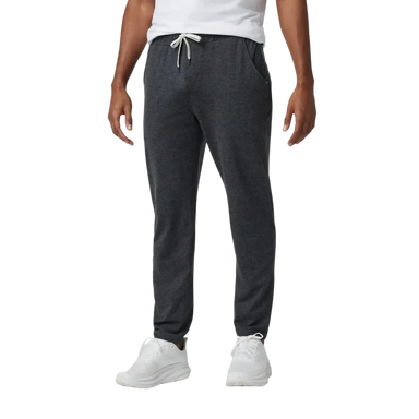 Vuori Men's Ponto Performance Pant in charcoal heather, on model front view