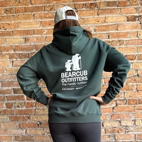 Bearcub Outfitters Unisex Logo Hoodie in Pine Grove, back view on model 