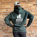 Bearcub Outfitters Unisex Logo Hoodie in Pine Grove, back view on model 