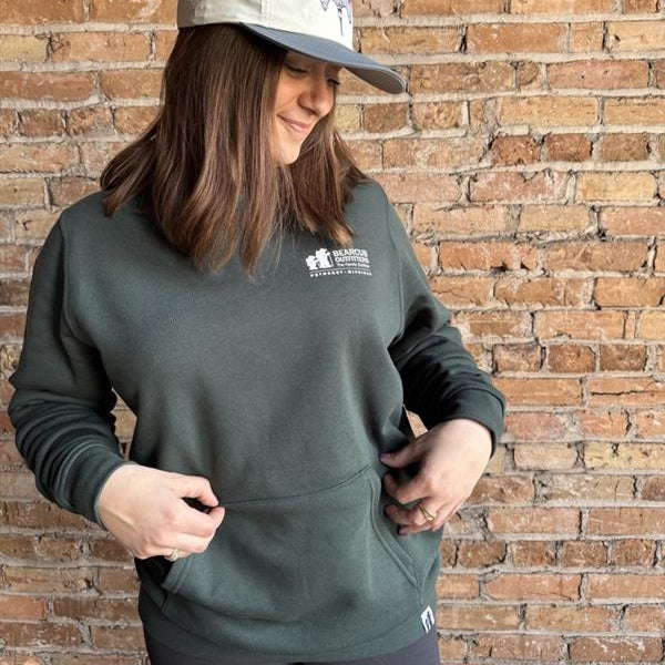 Bearcub Outfitters Unisex Logo Hoodie in Pine Grove, front view on model 
