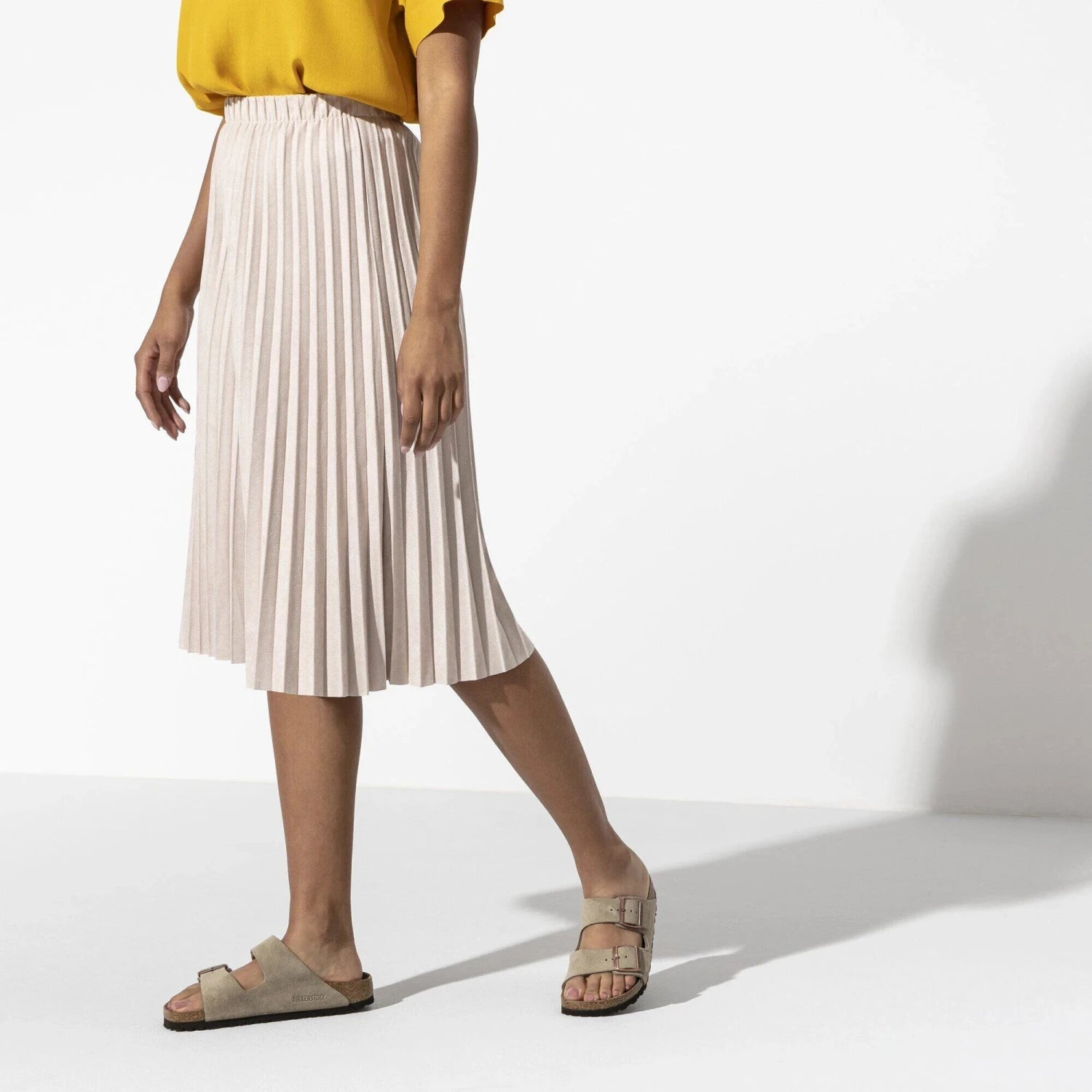 Birkenstock Arizona Soft Footbed Suede Sandal in taupe, on woman model view