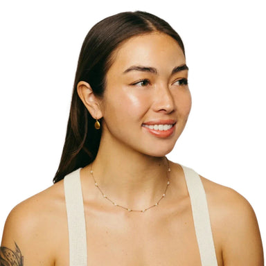 Bronwen Trail Necklace in mother of pearl on model