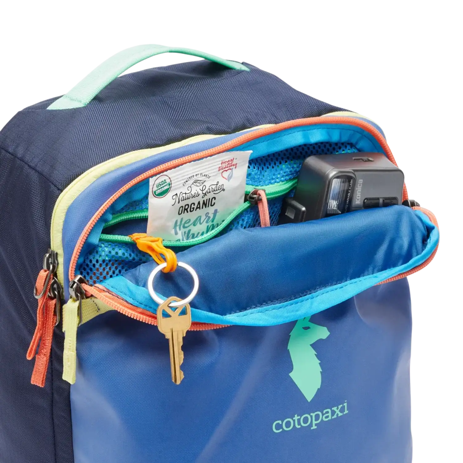 Cotopaxi Allpa Mini 20L Travel Pack in pacific & maritime, front view top pocket unzipped