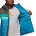 Cotopaxi M's Fuego Hooded Down Jacket, Woods Gulf, view of inside pocket on model