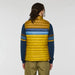 Person wearing a yellow and blue striped puffer vest on a plain background