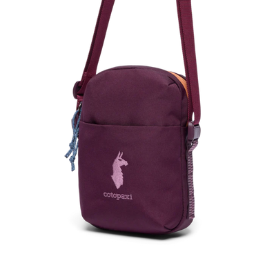 Purple crossbody bag with a brand logo on a white background