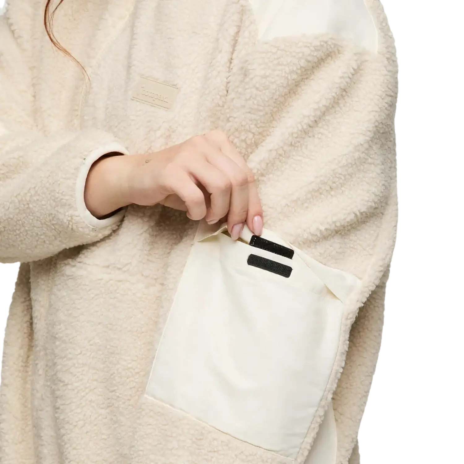 Cotopaxi Women's Bacano Fleece Jacket in cream & bone, sleeve pocket view