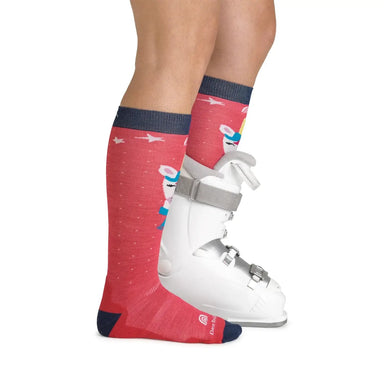 Darn Tough Girl's Magic Mountain Over-The-Calf Midweight Ski & Snowboard Sock Raspberry Side View with Snowboard Boot