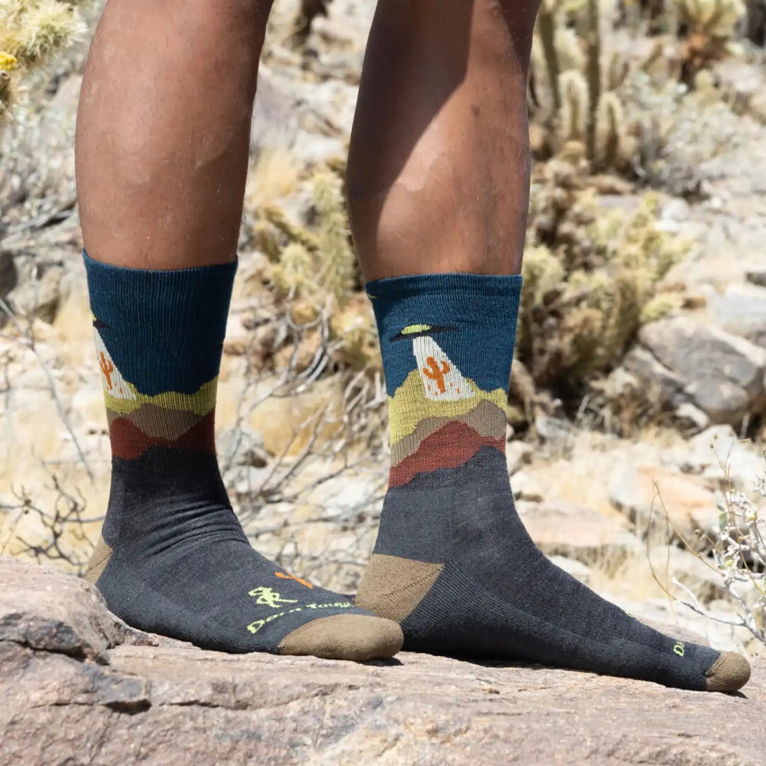 Darn Tough M's Spaced Out Micro Crew Lightweight Hiking Socks in Charcoal, side view on model 
