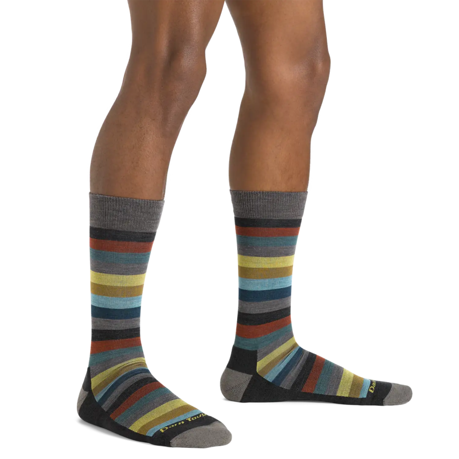 Darn Tough Men's Merlin Crew Lightweight Lifestyle Sock shown in the Charcoal color option. Shown on model.