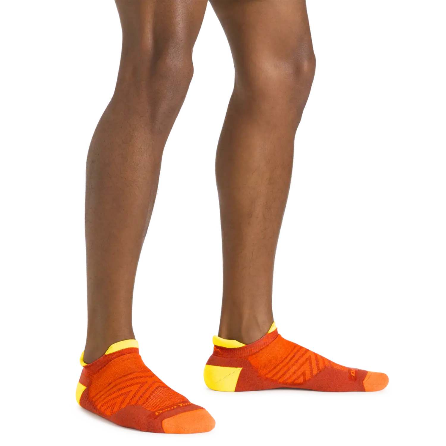 Darn Tough Men's Run No Show Tab Ultra-Lightweight Running Sock shown in the Lava color option. Shown on model.