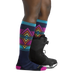 Darn Tough Women's Echo Over-the-Calf Midweight Ski & Snowboard Sock shown in the Eclipse color option on model.