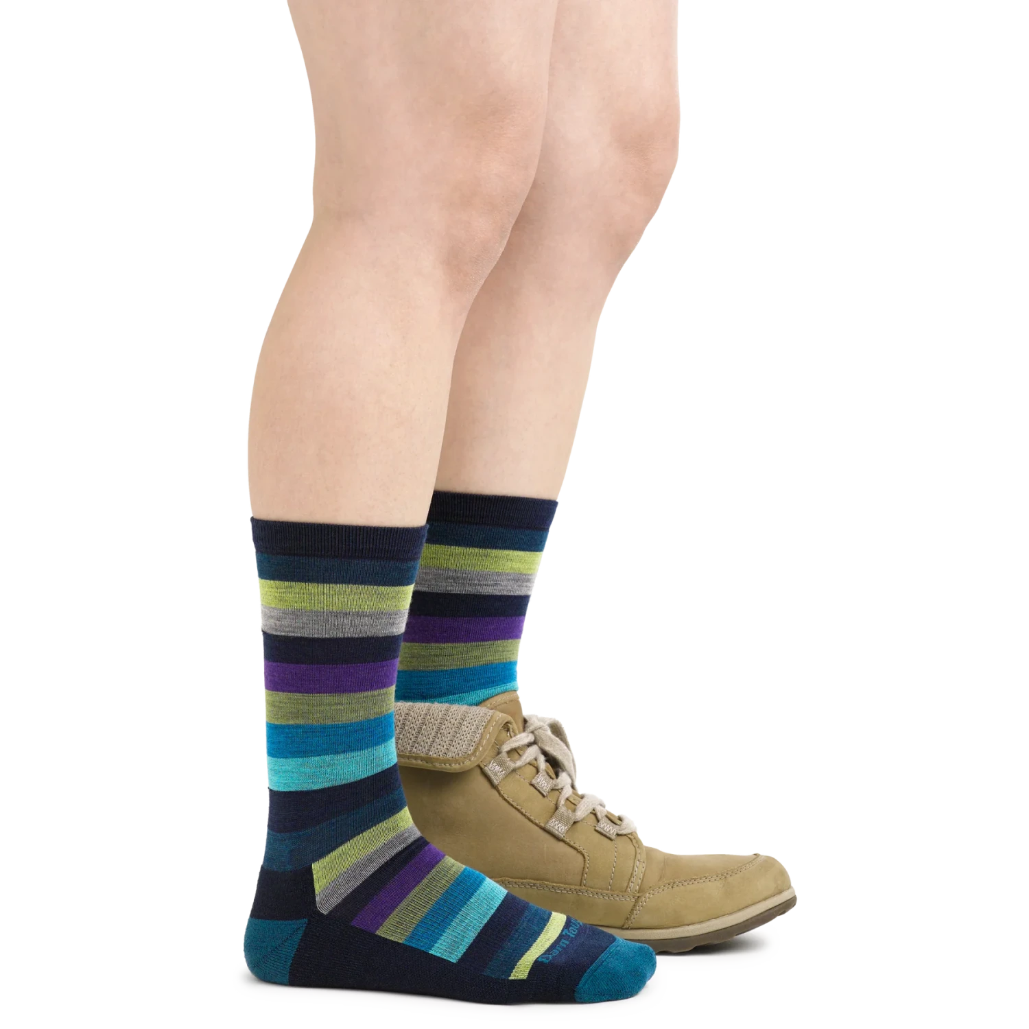 Darn Tough Women's Mystic Stripe Crew Lightweight Lifestyle Sock shown in the Dark Teal color option.  Shown on model with boot.