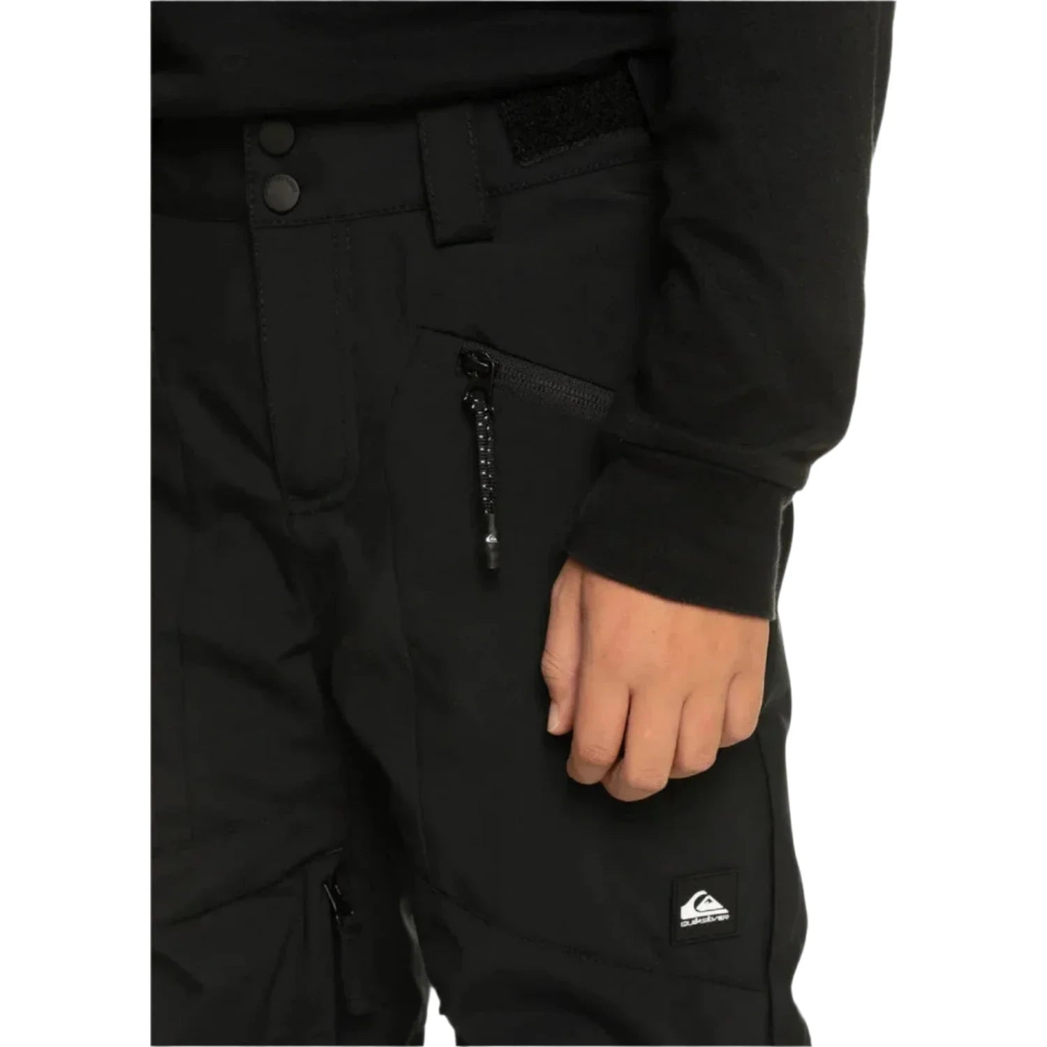 Quiksilver Kid's Estate Snow Pants in black, on model front zippered pocket detail