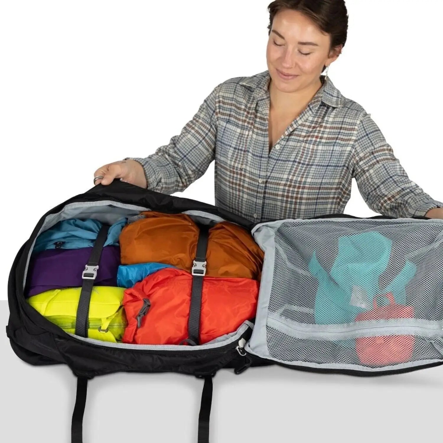 Osprey Fairview™ 55 Travel Pack in black, packed unzipped