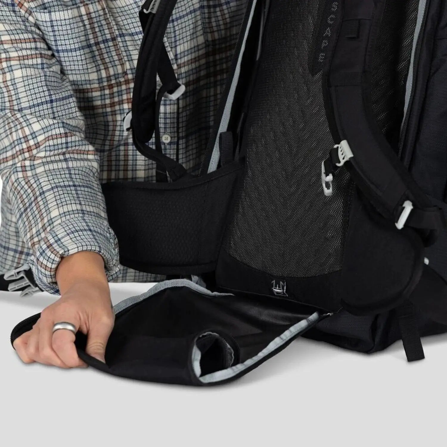 Osprey Fairview™ 55 Travel Pack in black, back panel unzipped