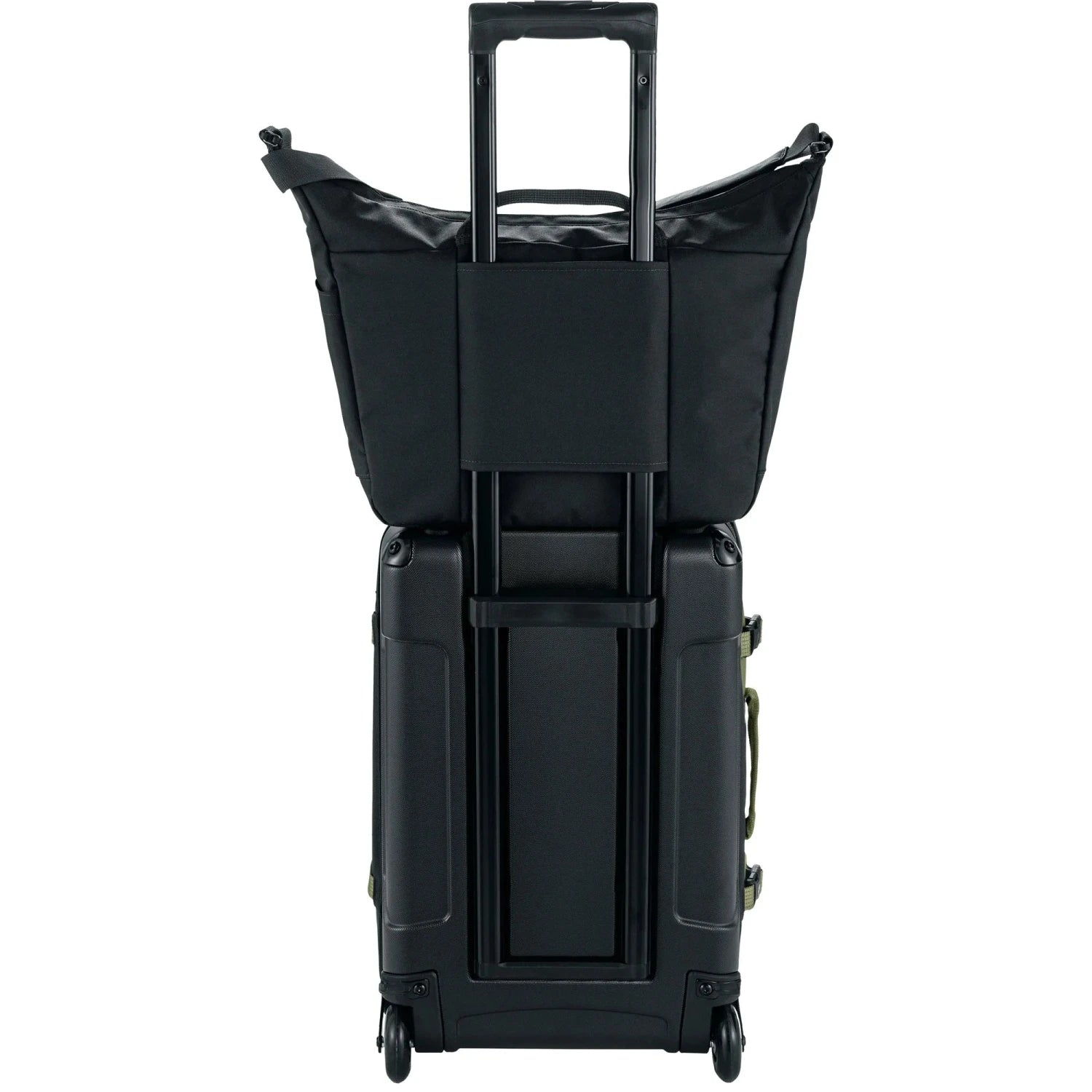 Fjall Raven Färden Crossbody in black, attached to roller suitcase