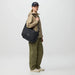 Fjall Raven Färden Crossbody in black, on model side bag