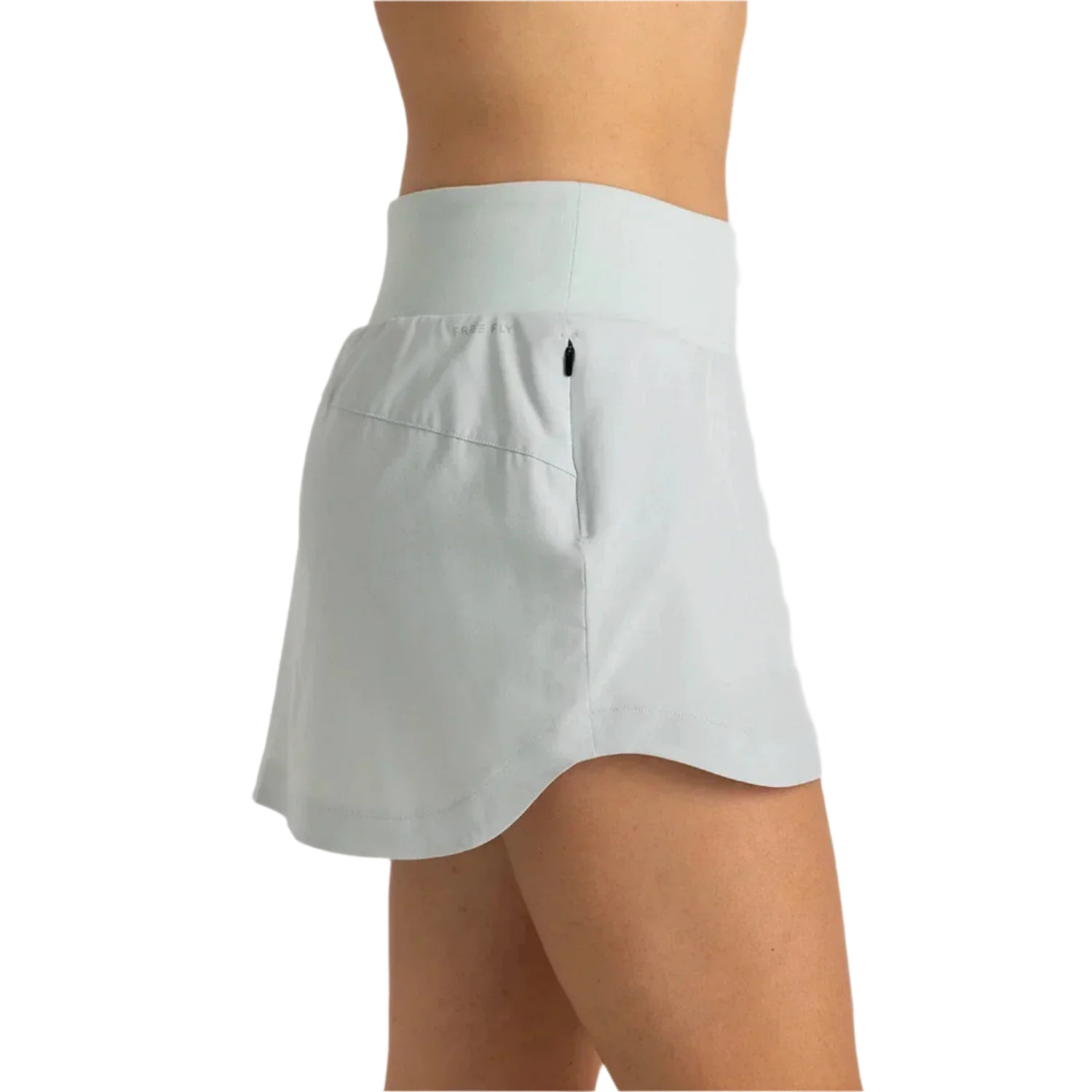 Free Fly Apparel Women's Bamboo-Lined Active Breeze Skort in sky grey, on model side view