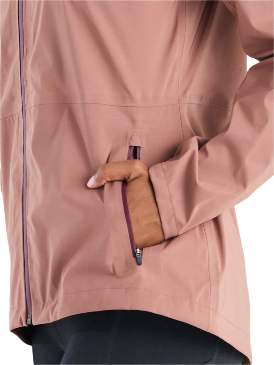 Free fly womens cloudshield rain jacket in light sangria color detail view of front pocket with model