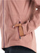 Free fly womens cloudshield rain jacket in light sangria color detail view of front pocket with model