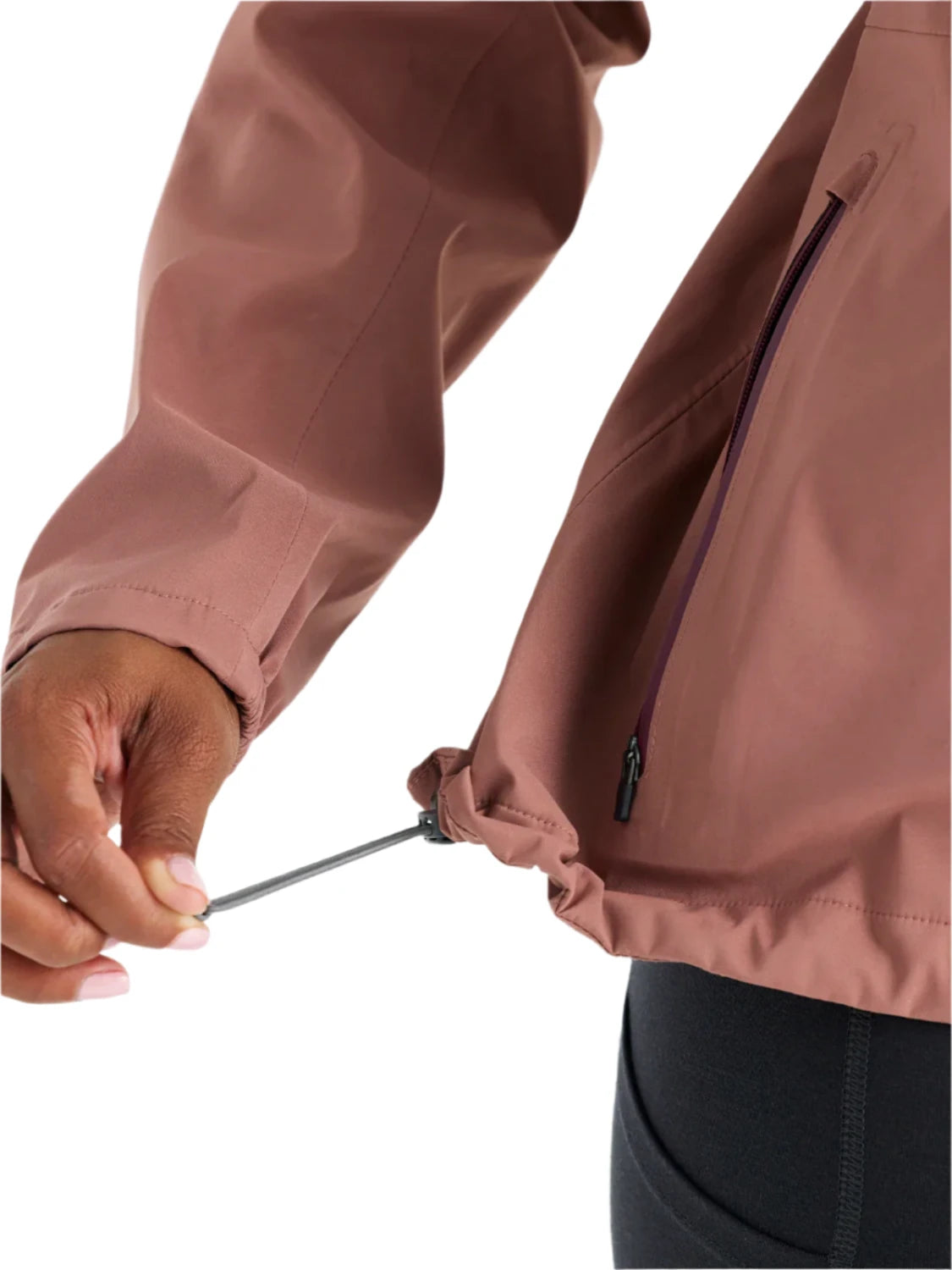 Free fly womens cloudshield rain jacket in light sangria color detailed view of waist cinch with model