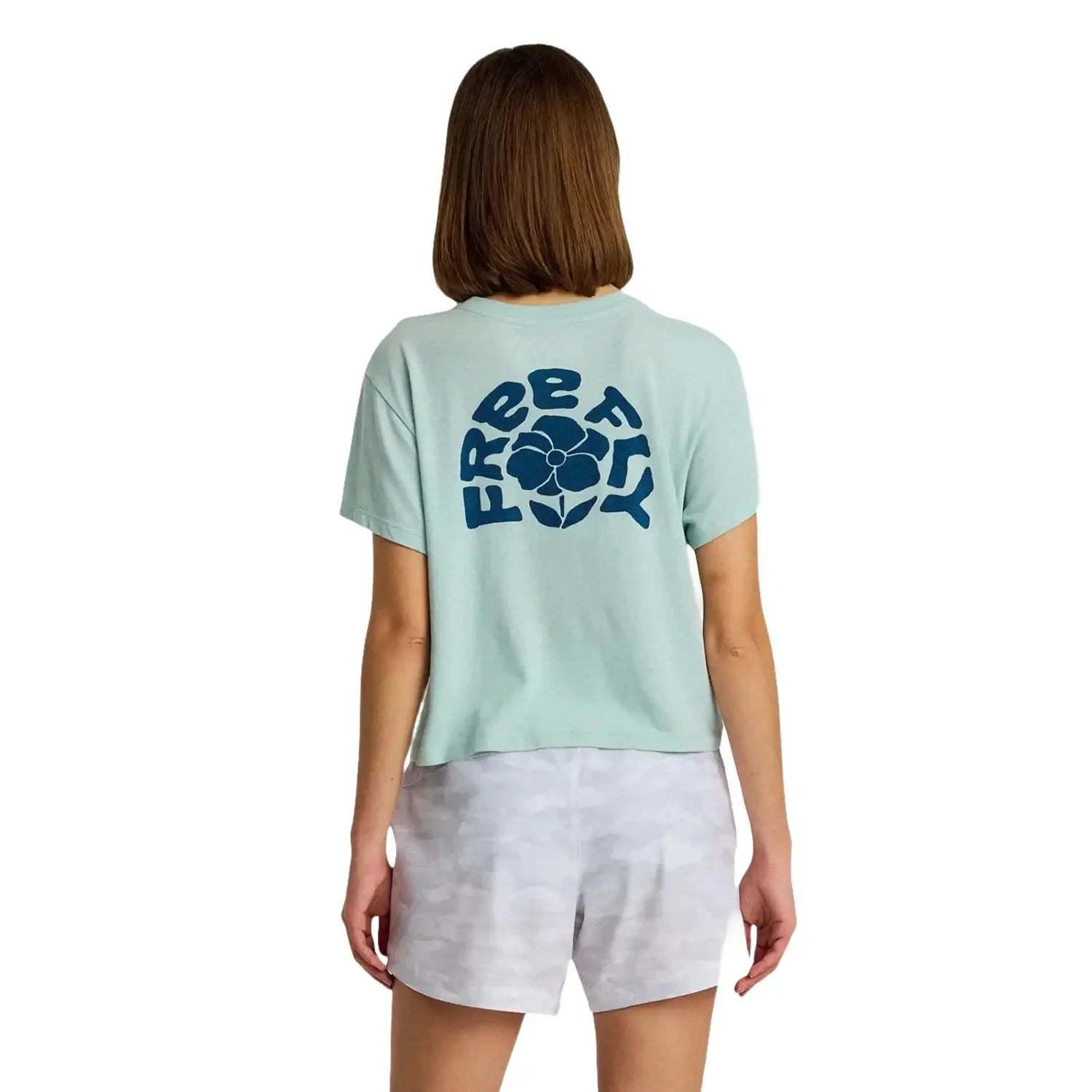 Free Fly Women's Poppy Tee in ocean mist heather, on model back