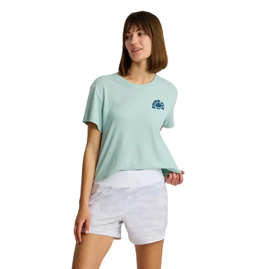 Free Fly Women's Poppy Tee in ocean mist heather, on model front