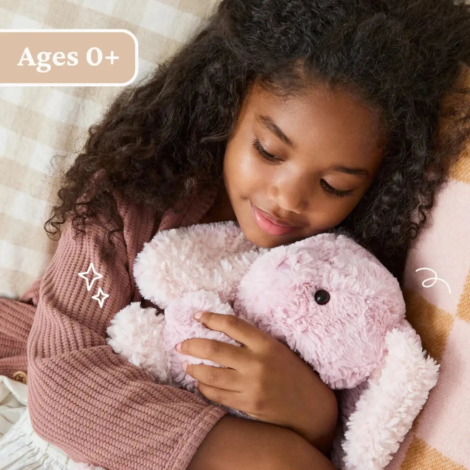 Gund Cozys Bunny 10", child cuddling stuffed animal