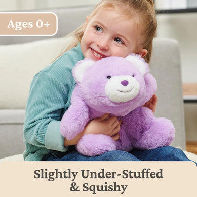GUND Snuffles® 10 in. in Lavender, front view with kid holding 