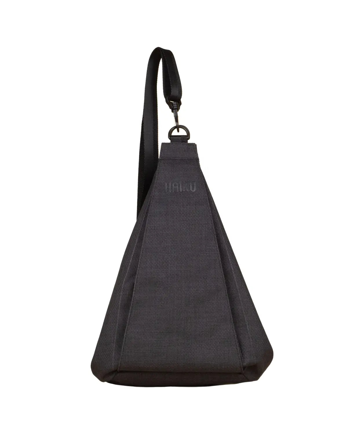 haiku crescent convertible sling bag in black in bloom front flat view