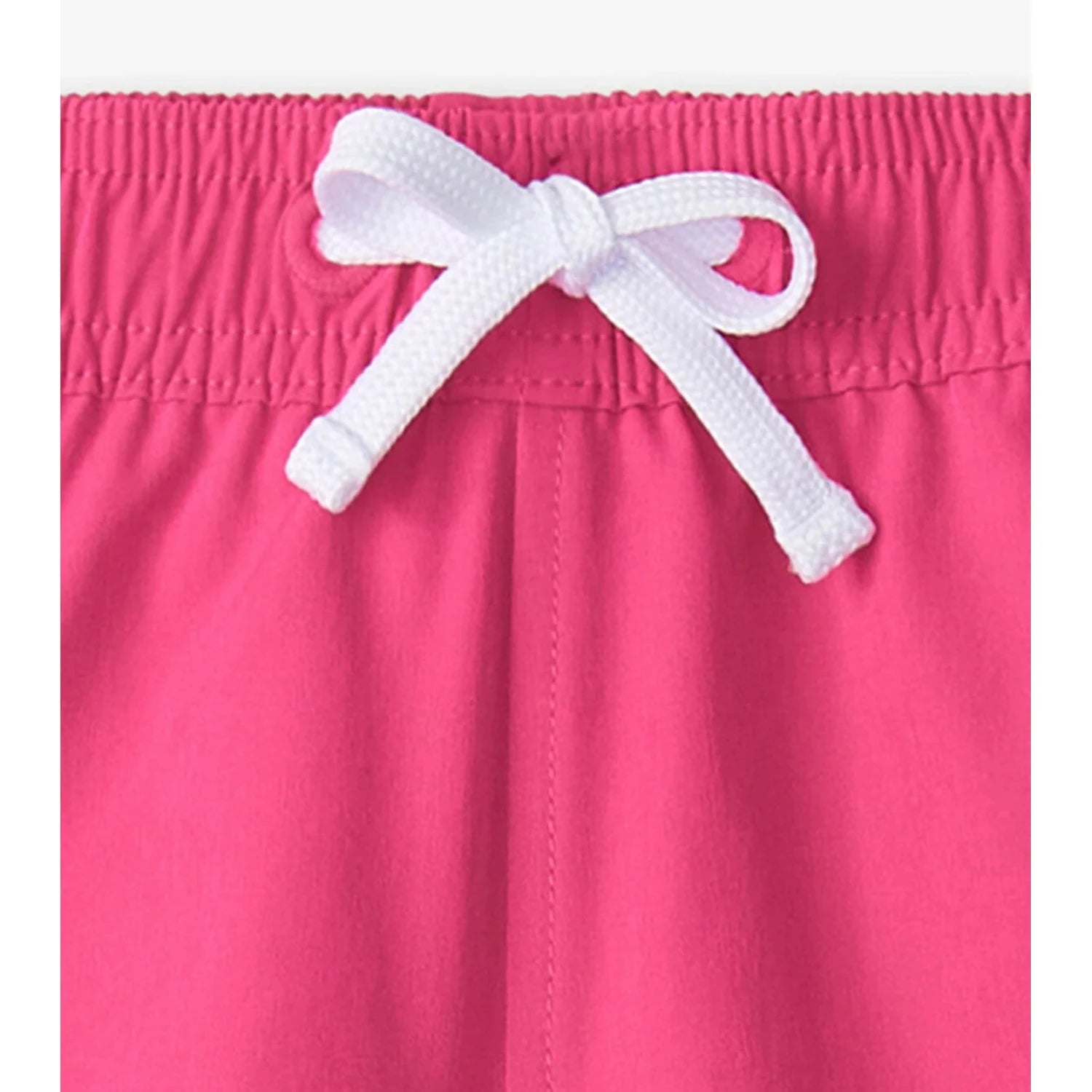 Hatley Girl's Pink Quick Dry Shorts shown in the Pink color option. Front Drawstring view.
