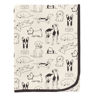 Kickee Pants Print Swaddling Blanket in natural dogs, folded flat