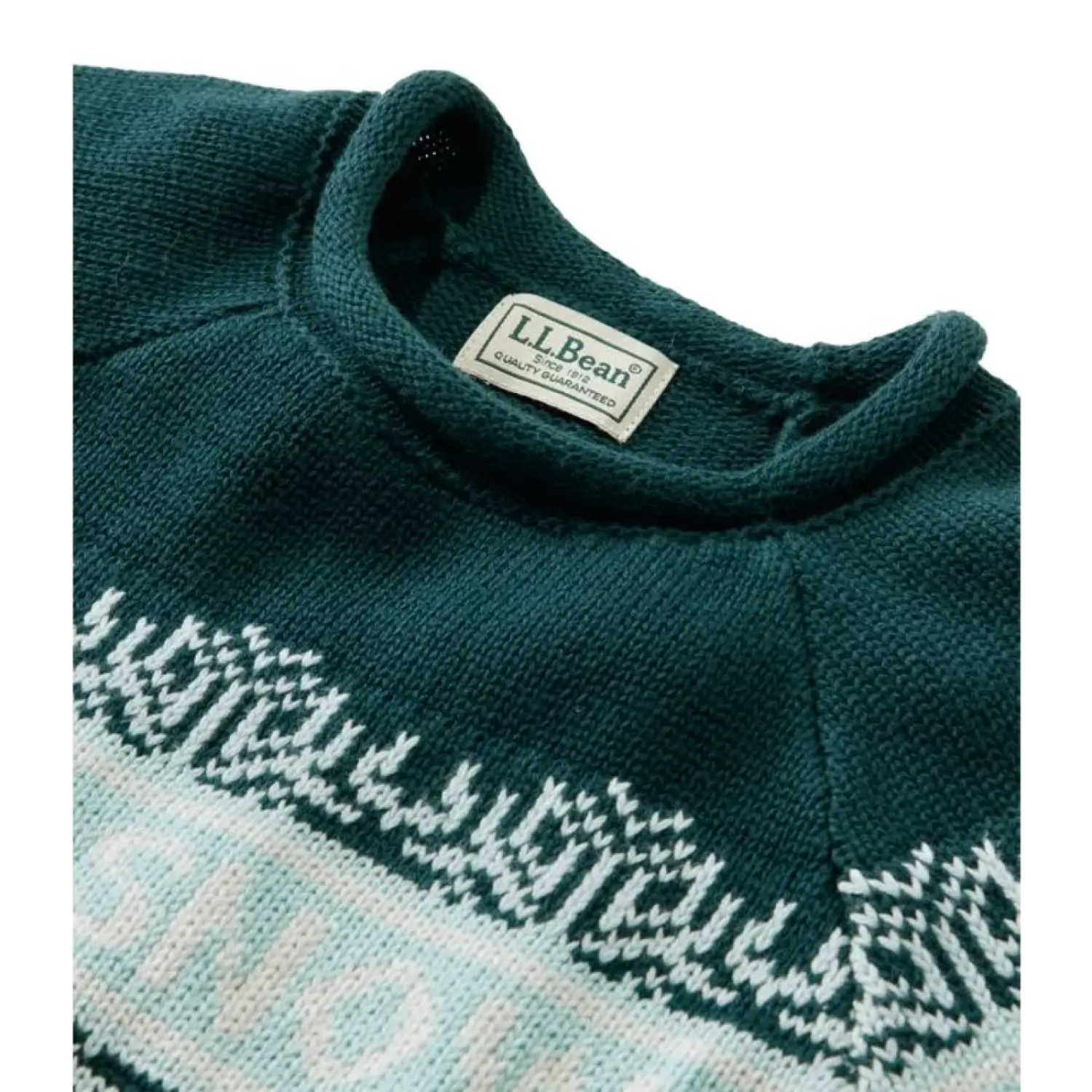 Green sweater collar detail.