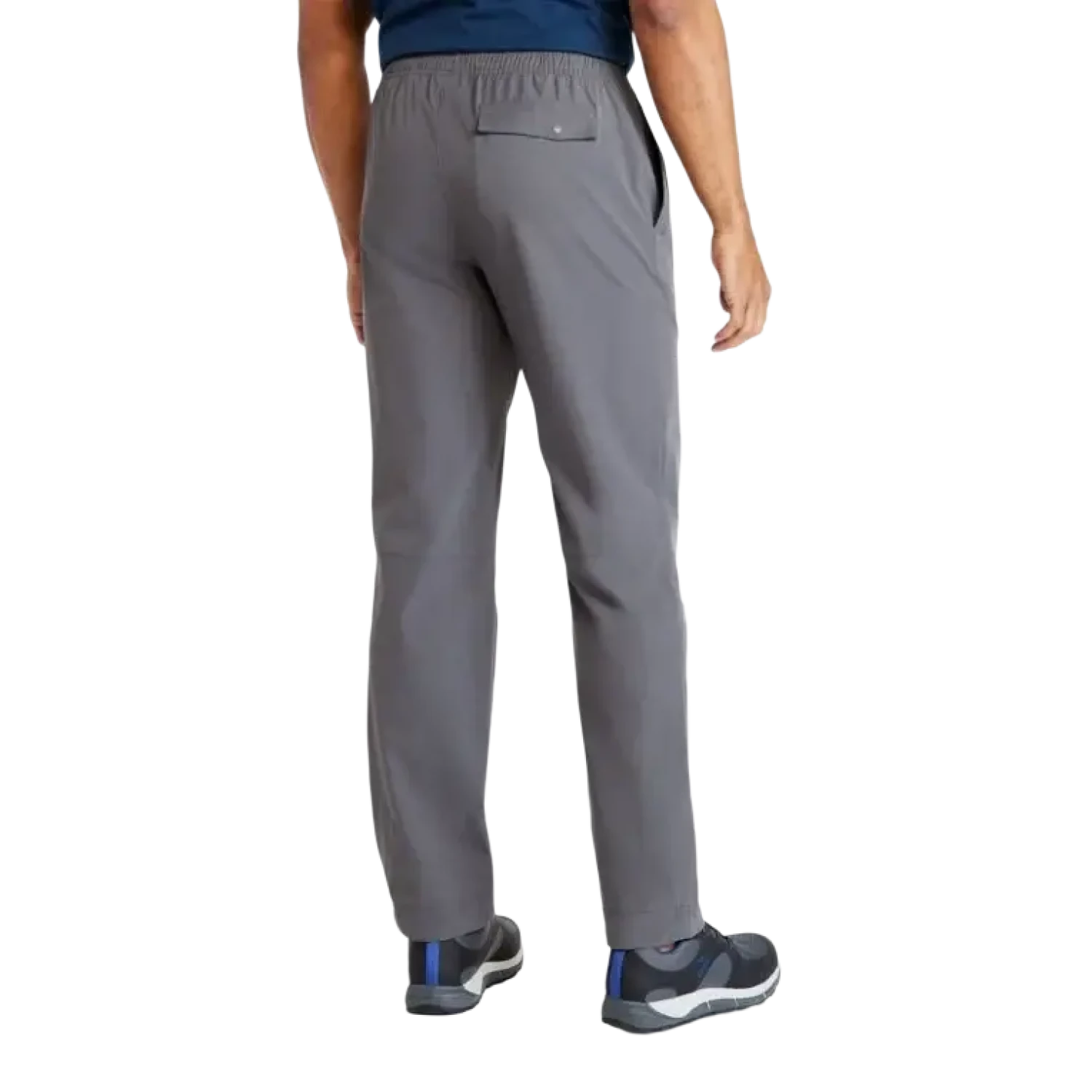 Person wearing gray pants on a white background