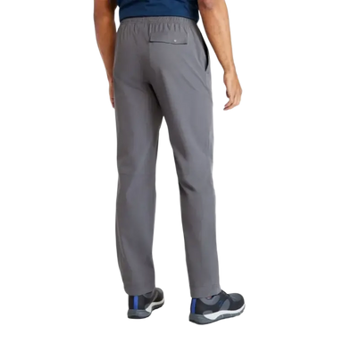 Person wearing gray pants on a white background