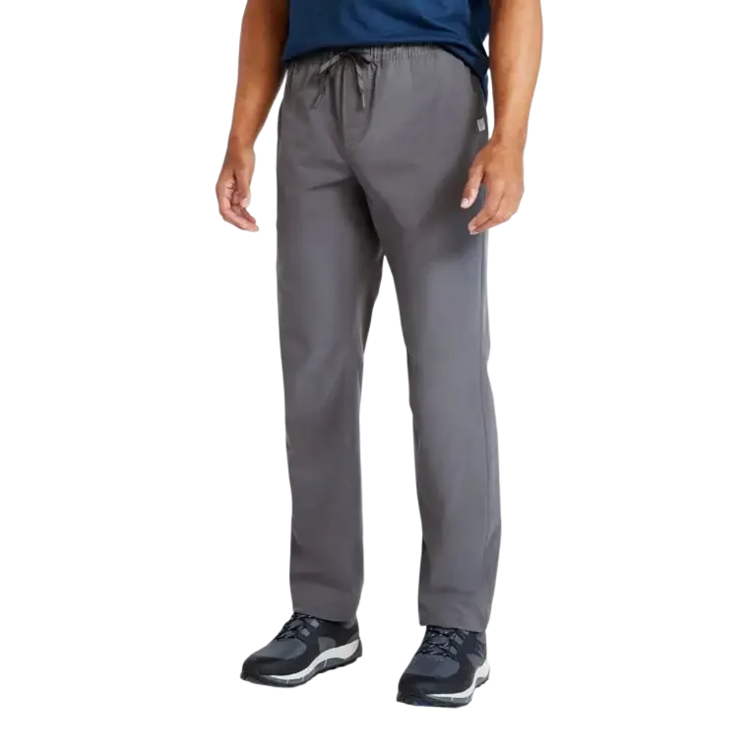 Person wearing gray pants on a white background