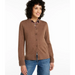 Woman wearing a brown cardigan over a patterned shirt with blue jeans on a white background