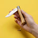 Opinel Néo6 Everyday Carry Folding Knife in olive wood, folded in hand