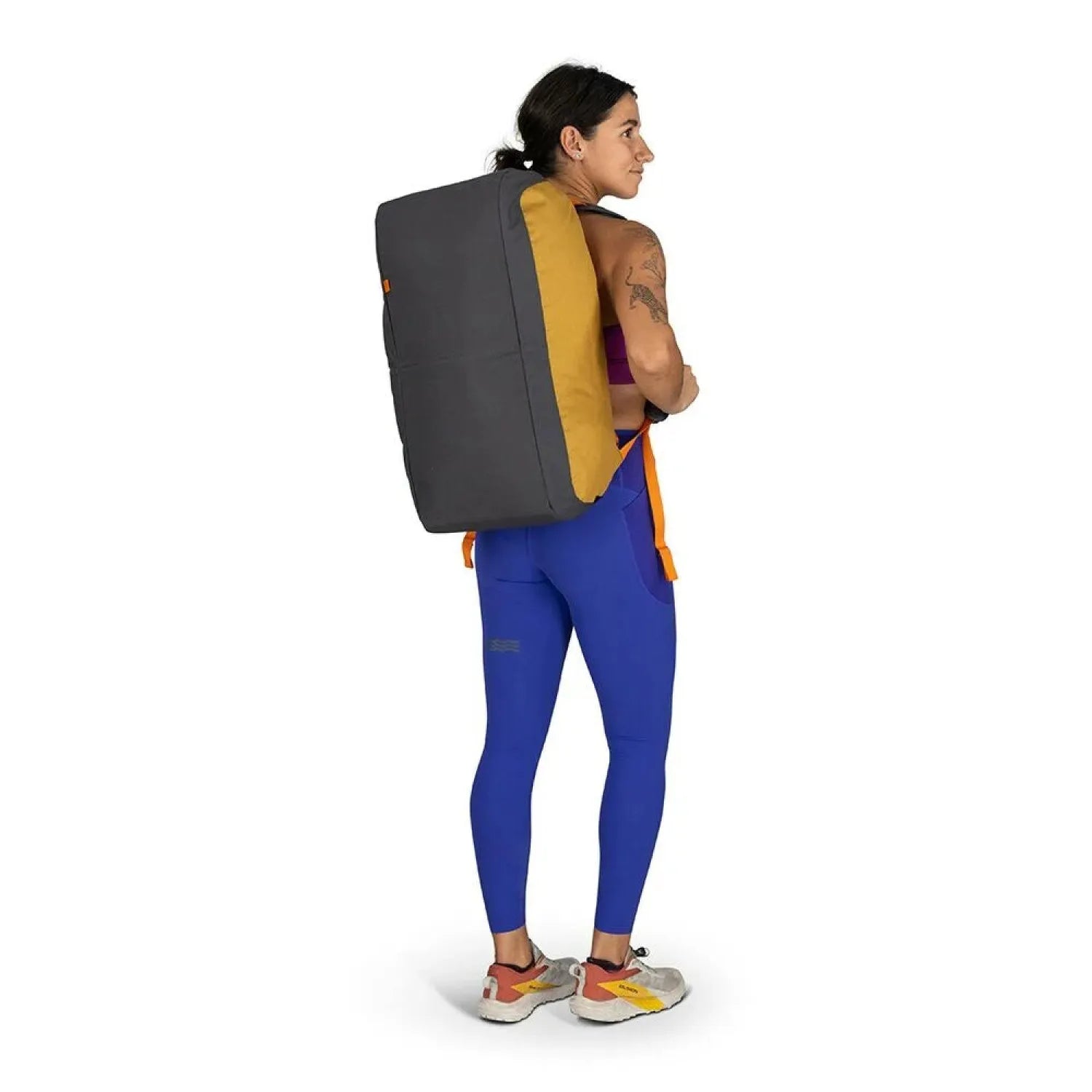 Osprey Daylite™ Duffel 45 in Yellow Tunnel Vision, back view of bag on model 