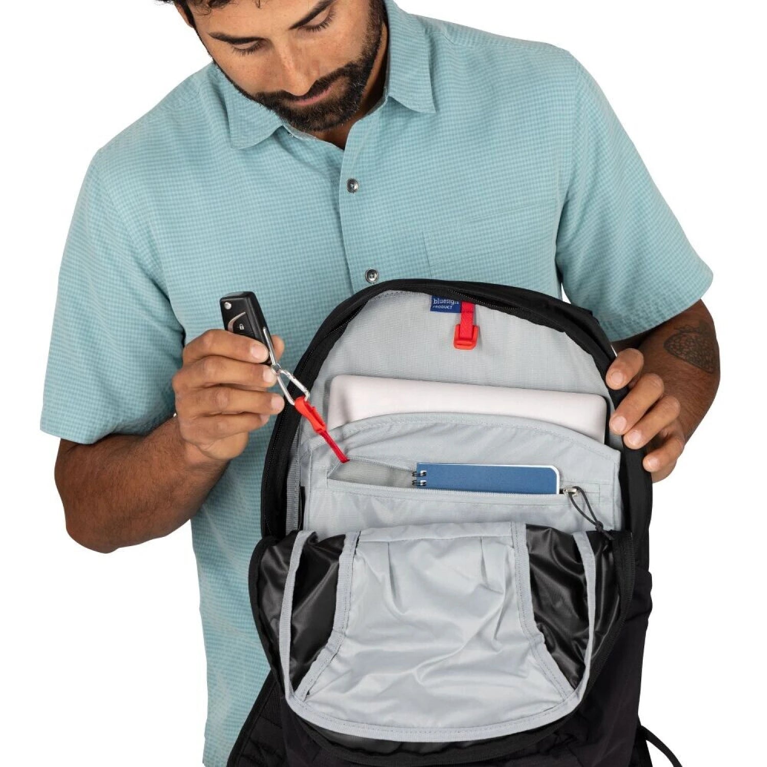 Osprey Farpoint™ 55 Travel Pack in black, daypack open view