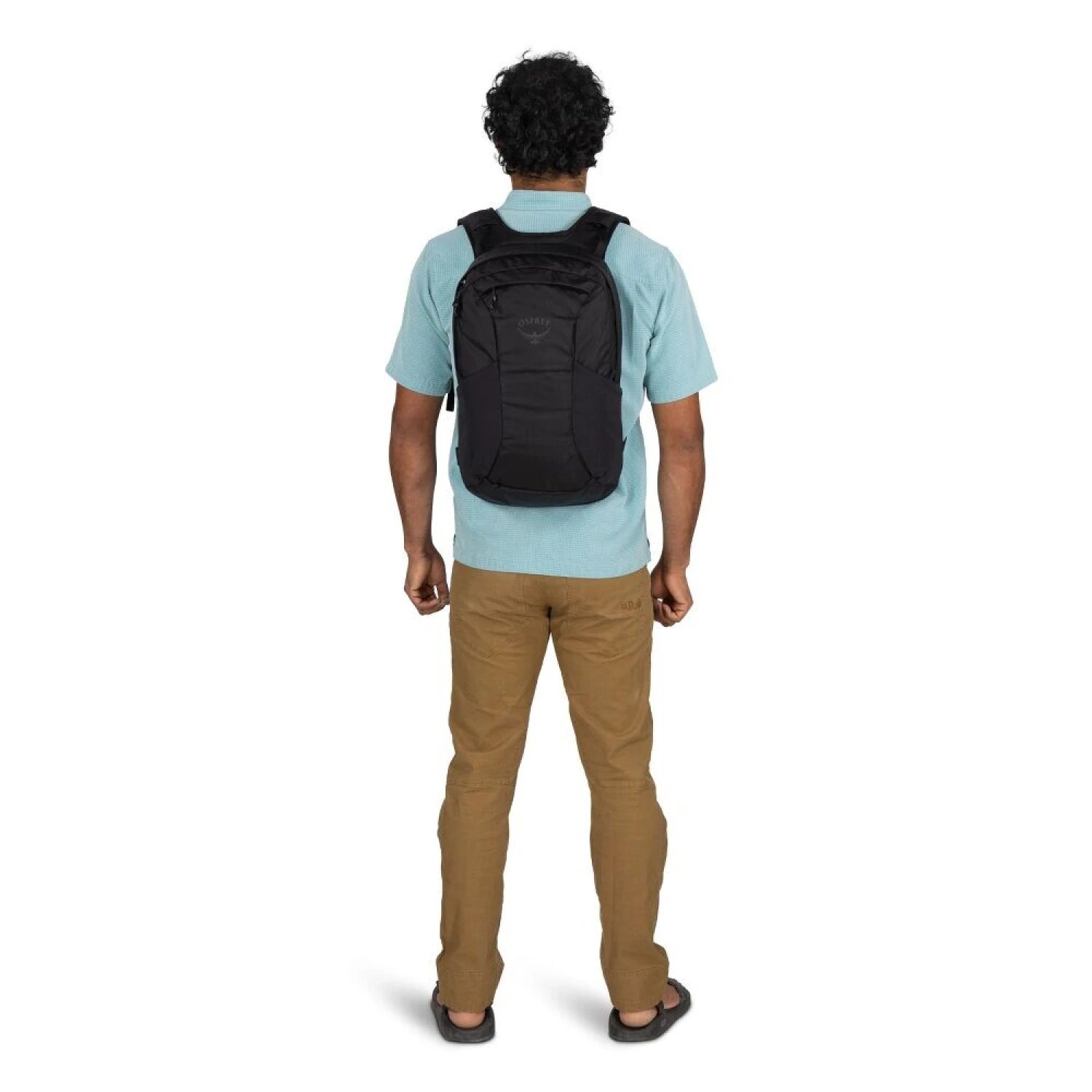Osprey Farpoint™ 55 Travel Pack in black, daypack on model view