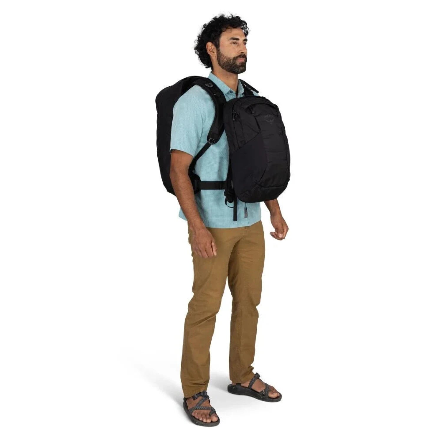 Osprey Farpoint™ 55 Travel Pack in black, on model view day pack on front