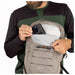 Osprey Raptor 14L Backpack with Reservoir in pediment grey, model showing top pocket detail