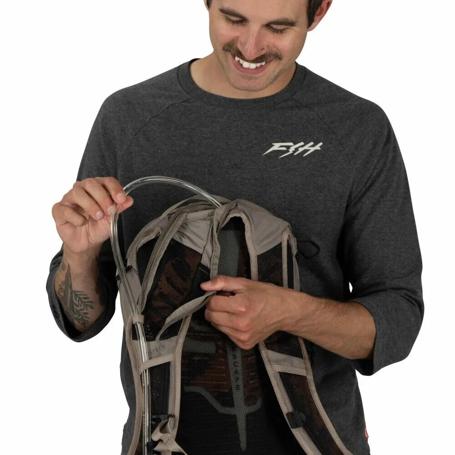 Osprey Raptor LT 12 Bike Hydration Pack in Pediment Grey Black, view of straw in bag 