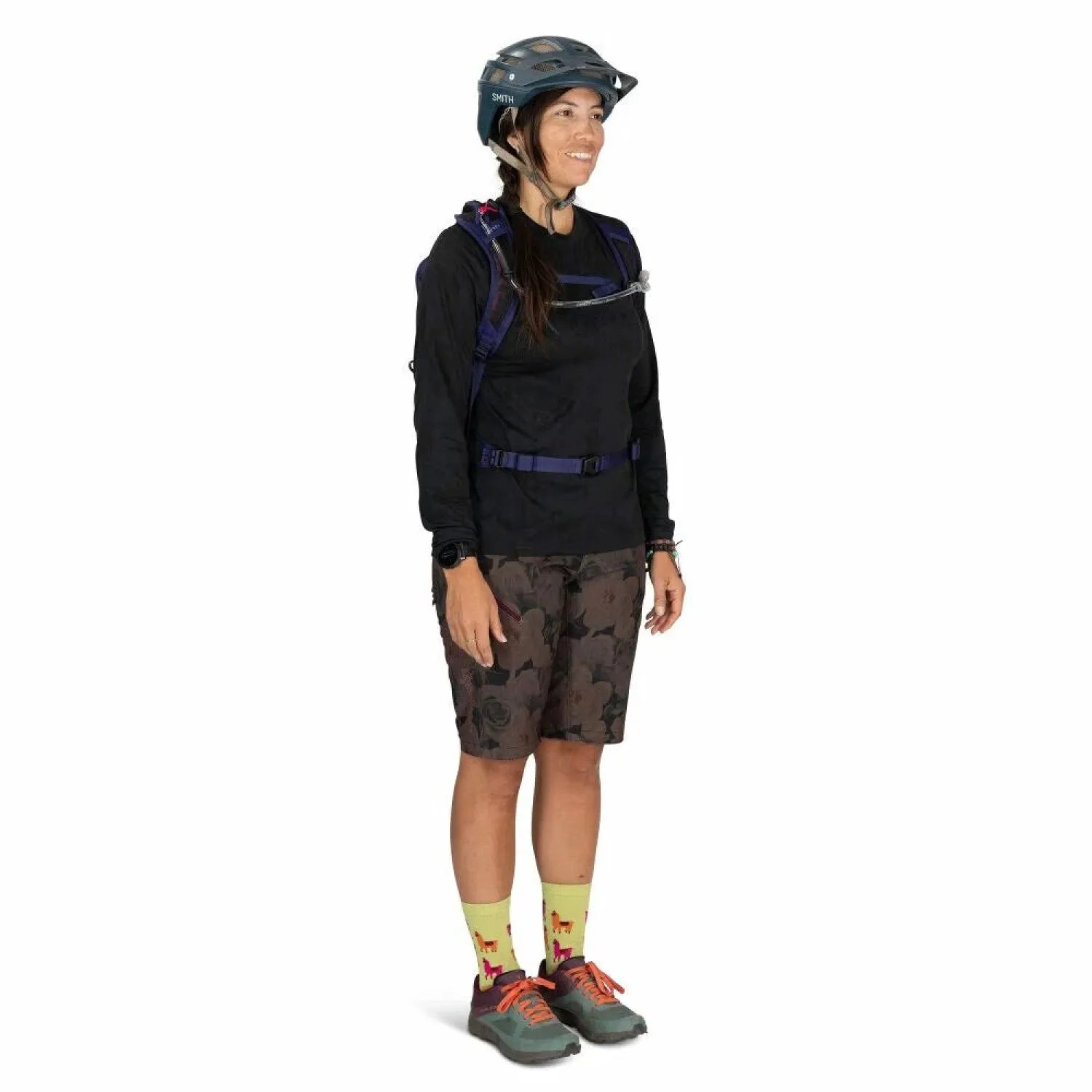 Osprey Raven LT 12 Bike Hydration Pack in Deep Fig Black, front view on model 