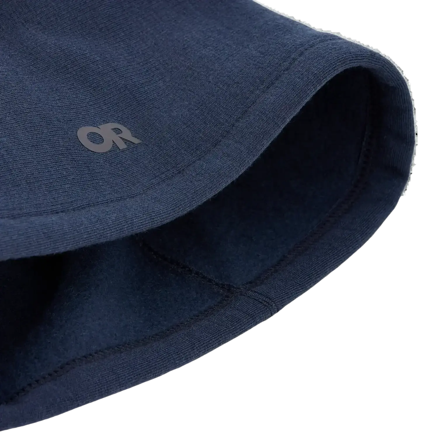 Close-up of a navy blue fabric with a logo on a white background