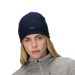Person wearing a navy beanie with a logo 